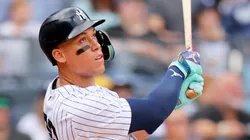 Aaron Judge #99 of the New York Yankees hits a home run to right field in the fourth inning against the Cleveland Guardians.