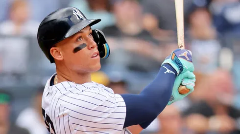 Aaron Judge #99 of the New York Yankees hits a home run to right field in the fourth inning against the Cleveland Guardians.