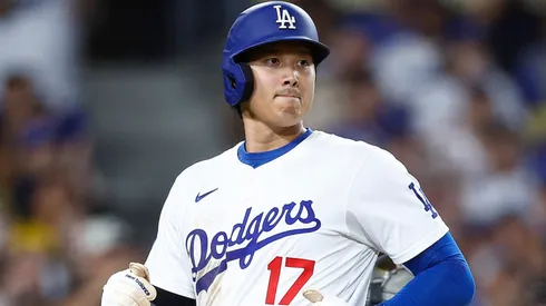 Shohei Ohtani #17 of the Los Angeles Dodgers scores a run against the Seattle Mariners in the fifth inning at Dodger Stadium on August 21, 2024 in Los Angeles, California.
