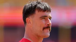 Travis Kelce #87 of the Kansas City Chiefs walks between plays during pregame warmups prior to a preseason game against the Detroit Lions at GEHA Field at Arrowhead Stadium on August 17, 2024 in Kansas City, Missouri.