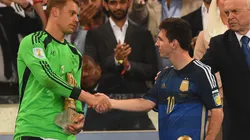 Golden Glove winner Manuel Neuer of Germany shakes hands with Golden Ball winner Lionel Messi of Argentina after Germany's 1-0 win in extra time during the 2014 FIFA World Cup Brazil Final match between Germany and Argentina at Maracana on July 13, 2014 in Rio de Janeiro, Brazil.