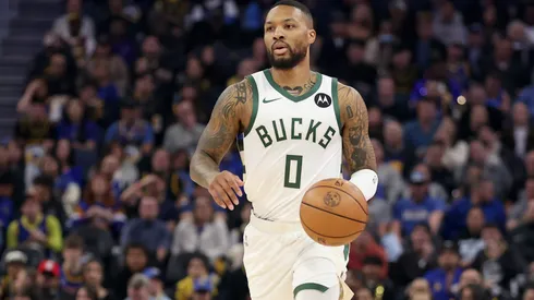 Damian Lillard #0 of the Milwaukee Bucks dribbles the ball against the Golden State Warriors