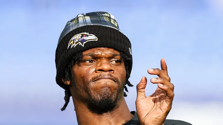 Lamar Jackson #8 of the Baltimore Ravens warms up before a preseason game against the Philadelphia Eagles at M&T Bank Stadium on August 9, 2024 in Baltimore, Maryland.