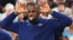 Gold medalist LeBron James of Team United States celebrates on the podium during the Men's basketball medal ceremony on day fifteen of the Olympic Games Paris 2024 at Bercy Arena on August 10, 2024 in Paris, France.