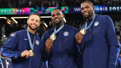 Stephen Curry, LeBron James, and Kevin Durant of Team United States pose for a photo during the Men's basketball medal ceremony on day fifteen of the Olympic Games Paris 2024 at Bercy Arena on August 10, 2024 in Paris, France.