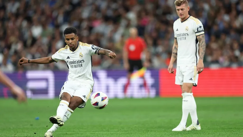 Rodrygo of Real Madrid takes a free kick in the first half as team mate Toni Kroos looks on during the LaLiga EA Sports match between Real Madrid CF and Deportivo Alaves. Clive Brunskill/Getty Images