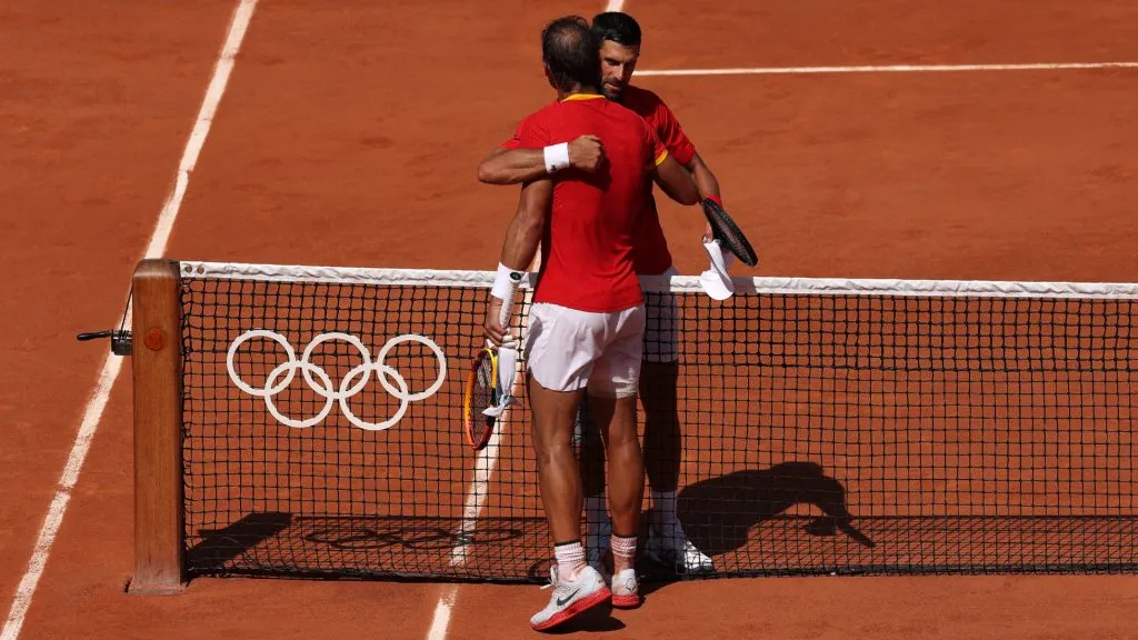 Winner Novak Djokovic is congratulated by Rafael Nadal after the Men’s Singles second round match of the Olympic Games Paris 2024. Matthew Stockman/Getty Images