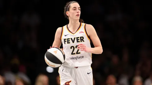 Caitlin Clark #22 of the Indiana Fever takes the ball out during the third quarter of a game against the New York Liberty