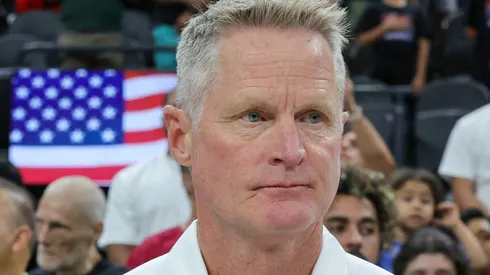 Head coach Steve Kerr of the United States stands on the court as the United States national anthem is performed before a 2023 FIBA World Cup exhibition game against Puerto Rico at T-Mobile Arena on August 07, 2023 in Las Vegas, Nevada. The United States defeated Puerto Rico 117-74.