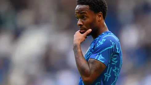 Raheem Sterling of Chelsea reacts while warming up prior to the Premier League match between Chelsea FC and Tottenham Hotspur at Stamford Bridge on August 14, 2022 in London, England.