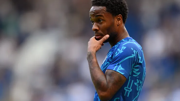 Raheem Sterling of Chelsea reacts while warming up prior to the Premier League match between Chelsea FC and Tottenham Hotspur at Stamford Bridge on August 14, 2022 in London, England.