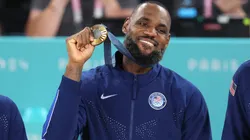 LeBron James #6 of Team United States celebrates on the podium during the Men's basketball medal ceremony on day fifteen of the Olympic Games Paris 2024 at Bercy Arena on August 10, 2024 in Paris, France.