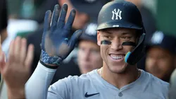 New York Yankees outfielder Aaron Judge (99) celebrates scoring at Kauffman Stadium Kansas City.