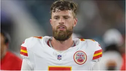 Kansas City Chiefs kicker Harrison Butker looks on during a game.