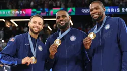 Stephen Curry, LeBron James, and Kevin Durant of Team United States pose for a photo during the Men's basketball medal ceremony on day fifteen of the Olympic Games Paris 2024 at Bercy Arena on August 10, 2024 in Paris, France.