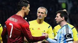 Cristiano Ronaldo of Portugal shakes hands with Lionel Messi of Argentina prior to the International Friendly between Argentina and Portugal at Old Trafford on November 18, 2014 in Manchester, England.