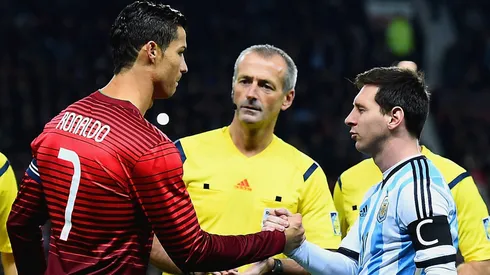 Cristiano Ronaldo of Portugal shakes hands with Lionel Messi of Argentina prior to the International Friendly between Argentina and Portugal at Old Trafford on November 18, 2014 in Manchester, England.