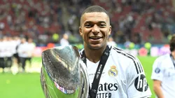 Kylian Mbappe of Real Madrid CF with Super Cup Trophy during the UEFA Super Cup between Real Madrid CF and Atalanta BC at Stadion Narodowy on August 14, 2024 in Warsaw, Poland.