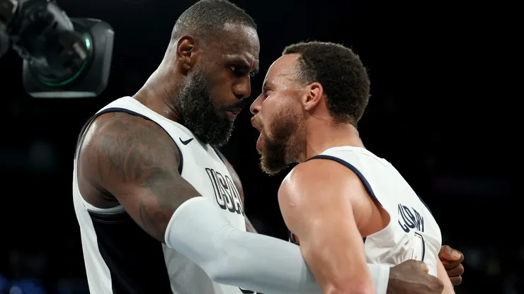 Lebron James #6 and Stephen Curry #4 of Team United States celebrate after their team's win against Team Serbia during a Men's basketball semifinals match between Team United States and Team Serbia on day thirteen of the Olympic Games Paris 2024 at Bercy Arena on August 08, 2024 in Paris, France.