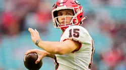 Carson Beck #15 of the Georgia Bulldogs warms up before the Capital One Orange Bowl against the Florida State Seminoles at Hard Rock Stadium on December 30, 2023 in Miami Gardens, Florida.