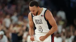 Stephen Curry #4 of Team United States reacts after a basket during a Men's basketball semifinals match between Team United States and Team Serbia on day thirteen of the Olympic Games Paris 2024 at Bercy Arena on August 08, 2024 in Paris, France.