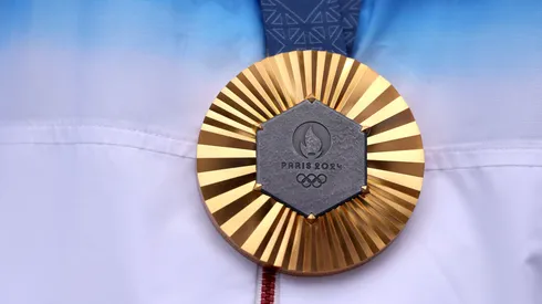 A detailed view of the gold medal of Sihyeon Lim of Team Republic of Korea, (obscured) on the podium after the Women’s Individual Archery competition on day eight of the Olympic Games Paris 2024 at Esplanade Des Invalides on August 03, 2024 in Paris, France.