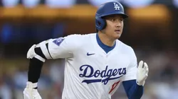 Shohei Ohtani #17 of the Los Angeles Dodgers runs to first on a ground out during the first inning against the Philadelphia Phillies at Dodger Stadium on August 07, 2024 in Los Angeles, California.
