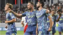 Ajax player Josip Sutalo celebrating with his teammtes