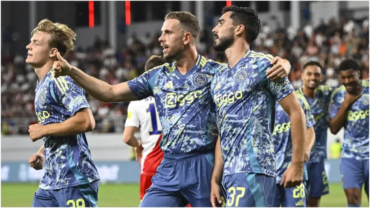 Ajax player Josip Sutalo celebrating with his teammtes