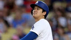 Shohei Ohtani #17 of the Los Angeles Dodgers reacts to his sly out during the third inning against the Philadelphia Phillies at Dodger Stadium on August 06, 2024 in Los Angeles, California.