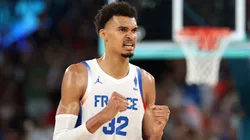 Victor Wembanyama #32 of Team France reacts during a Men's basketball quarterfinal game between Team Canada and Team France on day eleven of the Olympic Games Paris 2024 at Bercy Arena on August 06, 2024 in Paris, France.