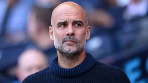 Pep Guardiola, Manager of Manchester City, looks on prior to the Premier League match between Manchester City and West Ham United.