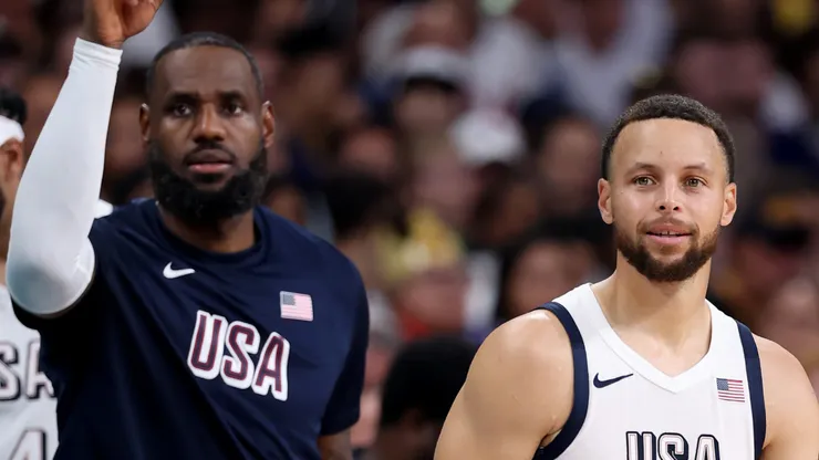 LeBron James #6 and Stephen Curry #4 of Team United States look on during a Men's Group Phase - Group C game between the United States and South Sudan on day five of the Olympic Games Paris 2024 at Stade Pierre Mauroy on July 31, 2024 in Lille, France.