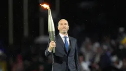 Zinedine Zidane holding the Olympics torchZinedine Zidane holding the Olympics torch