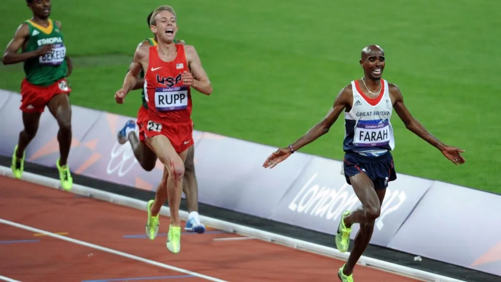 Mohamed Farah of Great Britain crosses the line to win gold in the Men’s 10,000m Final on Day 8 of the London 2012 Olympic Games at Olympic Stadium on August 4, 2012 in London, England. (Photo by Harry How/Getty Images)