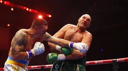 Oleksandr Usyk punches Tyson Fury during the IBF, WBA, WBC, WBO and Undisputed Heavyweight titles' fight between Tyson Fury and Oleksandr Usyk at Kingdom Arena on May 18, 2024 in Riyadh, Saudi Arabia. (Photo by Richard Pelham/Getty Images)