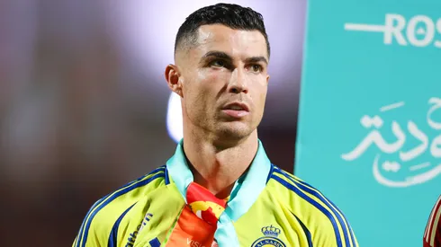 Cristiano Ronaldo of Al Nassr wearing a scarf and arm band for Saudi Arabia Foundation Day during the Saudi Pro League match between Al Ettifaq and Al Nassr at Al Ettifaq Stadium on September 20, 2024 in Ad Dammam, Saudi Arabia.