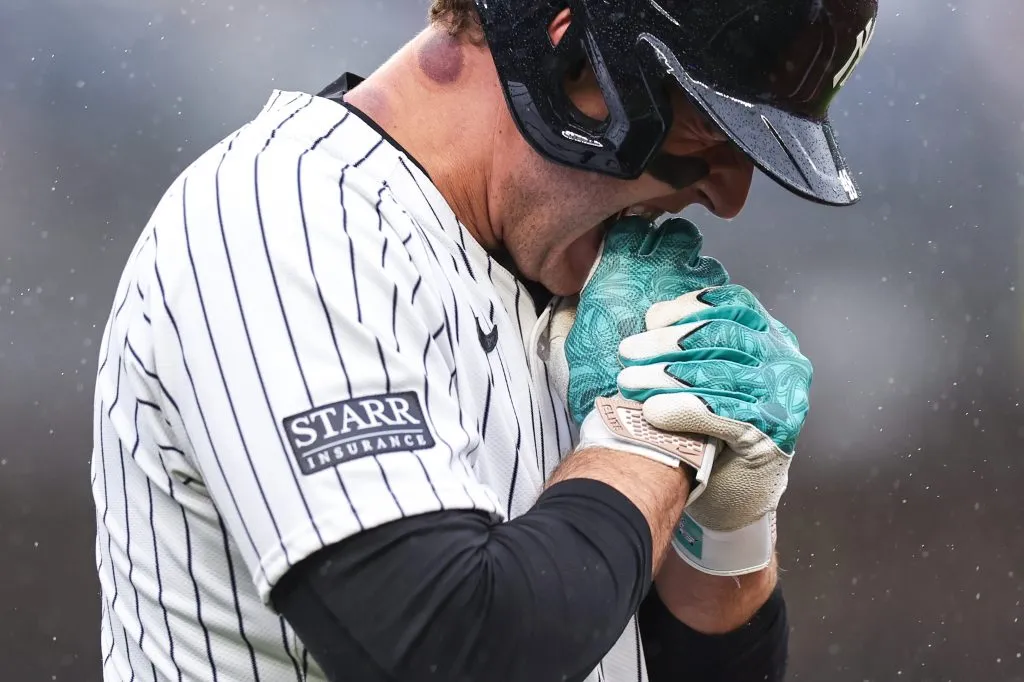 NEW YORK, NEW YORK – SEPTEMBER 28: Anthony Rizzo #48 of the New York Yankees bites his hand after being hit by a pitch during the seventh inning of the game against the Pittsburgh Pirates at Yankee Stadium on September 28, 2024 in New York City. (Photo by Dustin Satloff/Getty Images)