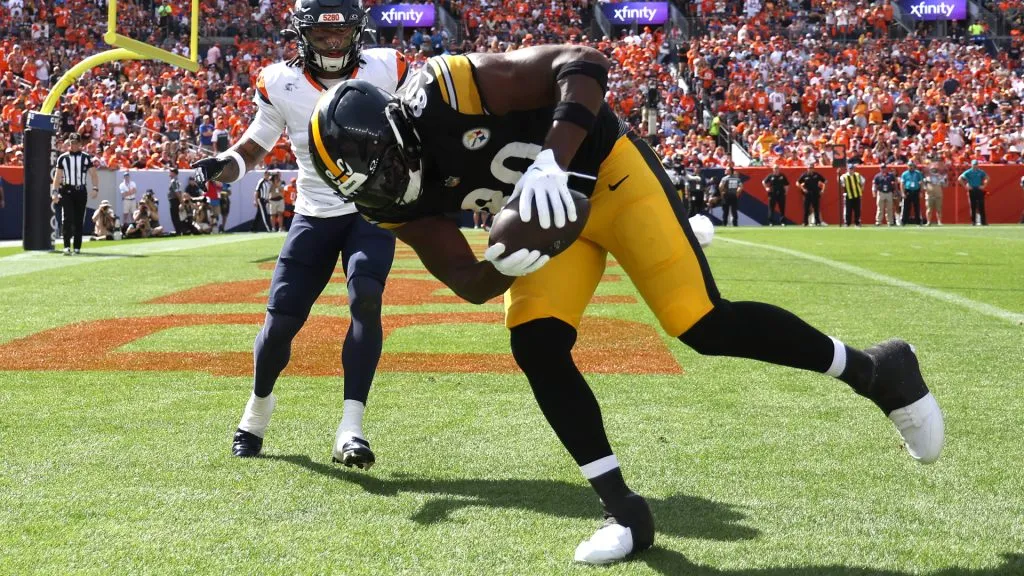 Darnell Washington #80 of the Pittsburgh Steelers scores a touchdown during the first half against the Denver Broncos at Empower Field At Mile High on September 15, 2024 in Denver, Colorado. (Photo by Matthew Stockman/Getty Images)