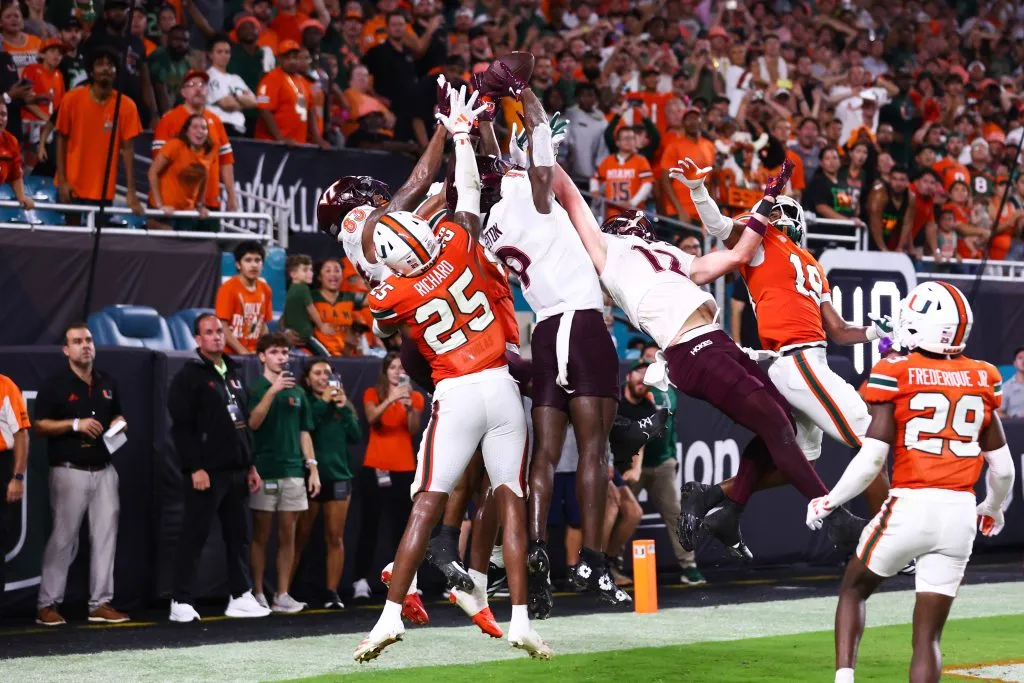 MIAMI GARDENS, FLORIDA – SEPTEMBER 27: Miami Hurricanes defenders break up a pass intended for Da’Quan Felton #9 of the Virginia Tech Hokies during the fourth quarter of the game at Hard Rock Stadium on September 27, 2024 in Miami Gardens, Florida. (Photo by Megan Briggs/Getty Images)