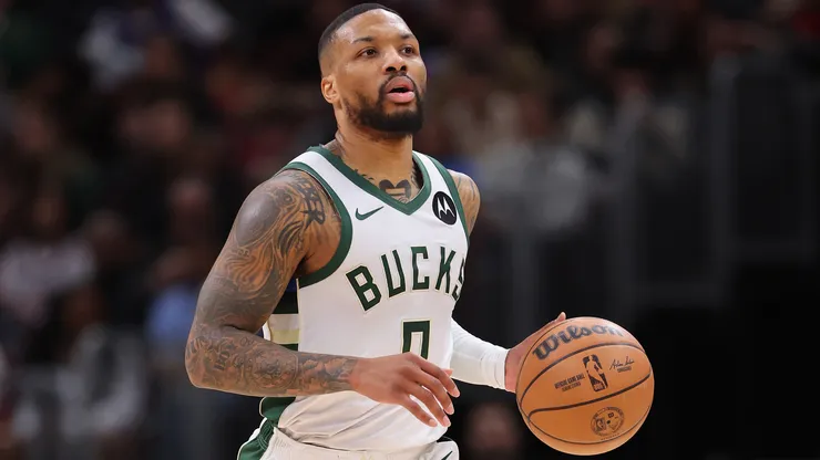 Damian Lillard #0 of the Milwaukee Bucks dribbles up the court against the Chicago Bulls