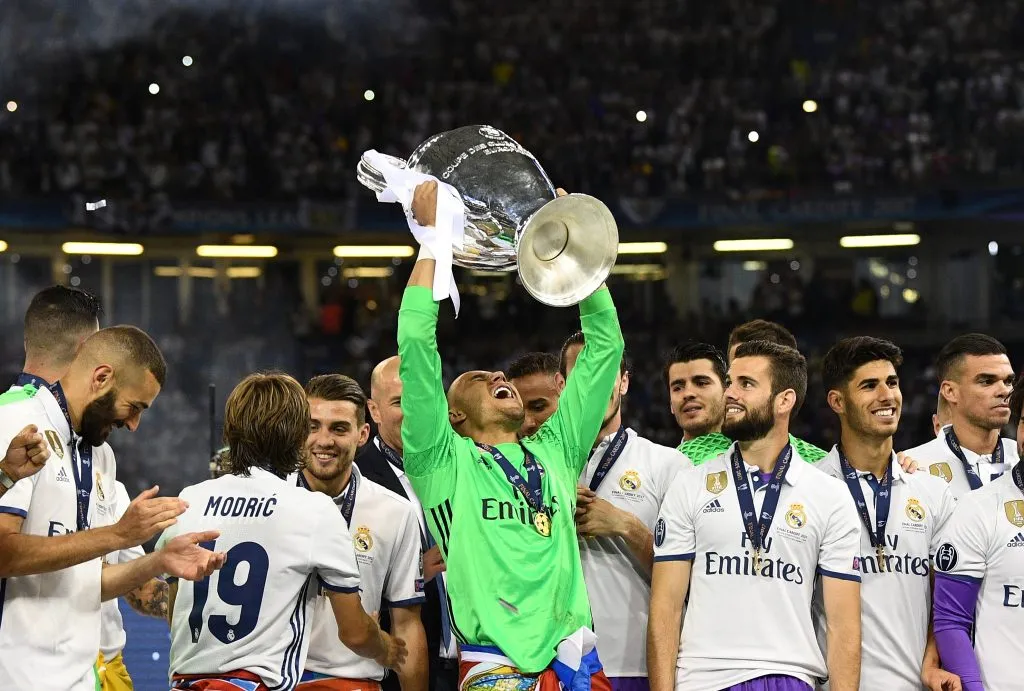 Keylor Navas of Real Madrid lifts The Champions League trophy after the UEFA Champions League Final between Juventus and Real Madrid. David Ramos/Getty Images