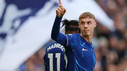 Cole Palmer of Chelsea celebrates scoring his team's third goal and his hat trick during the Premier League match between Chelsea FC and Brighton & Hove Albion FC at Stamford Bridge on September 28, 2024 in London, England.