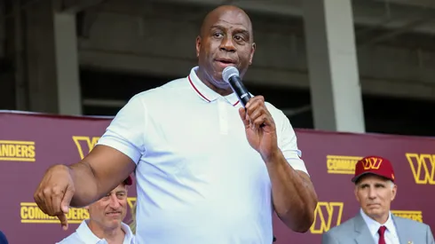 Earvin 'Magic' Johnson, a new owner of the Washington Commanders, delivers remarks during a press conference introducing the team's new ownership at on July 21, 2023 in Landover, Maryland. NFL teams owners have unanimously approved a $6.05 billion sale of the Commanders from Dan Snyder to a group led by Josh Harris.