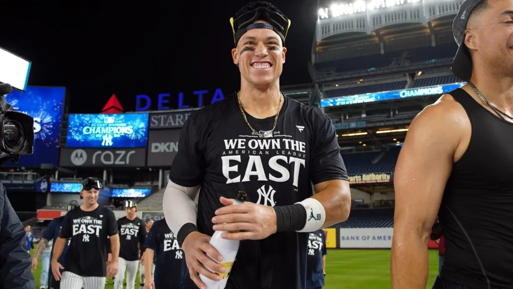 Aaron Judge #99 of the New York Yankees celebrates after winning the AL East title against the Baltimore Orioles at Yankee Stadium on September 26, 2024 in New York City. (Photo by Evan Bernstein/Getty Images)