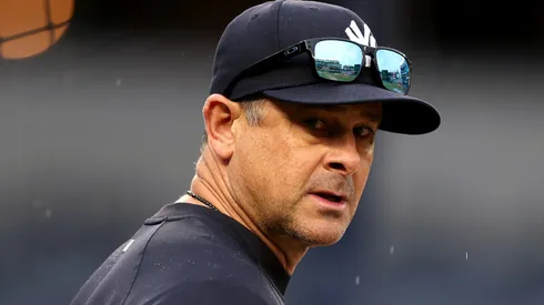 Aaron Boone #17 of the New York Yankees looks on during batting practice before the game against the Baltimore Orioles at Yankee Stadium on September 25, 2024 in the Bronx borough of New York City.