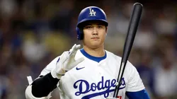 Shohei Ohtani #17 of the Los Angeles Dodgers salutes the San Diego Padres dugout as we walks up to bat during the first inning at Dodger Stadium on September 26, 2024 in Los Angeles, California.
