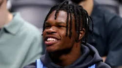 Travis Hunter of the Colorado Buffaloes football team watches the action between the Denver Nuggets and the Golden State Warriors at Ball Arena on December 25, 2023 in Denver, Colorado