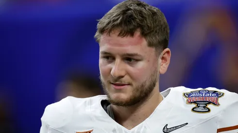 Quinn Ewers #3 of the Texas Longhorns looks on prior to playing against the Washington Huskies during the CFP Semifinal Allstate Sugar Bowl at Caesars Superdome on January 01, 2024 in New Orleans, Louisiana.