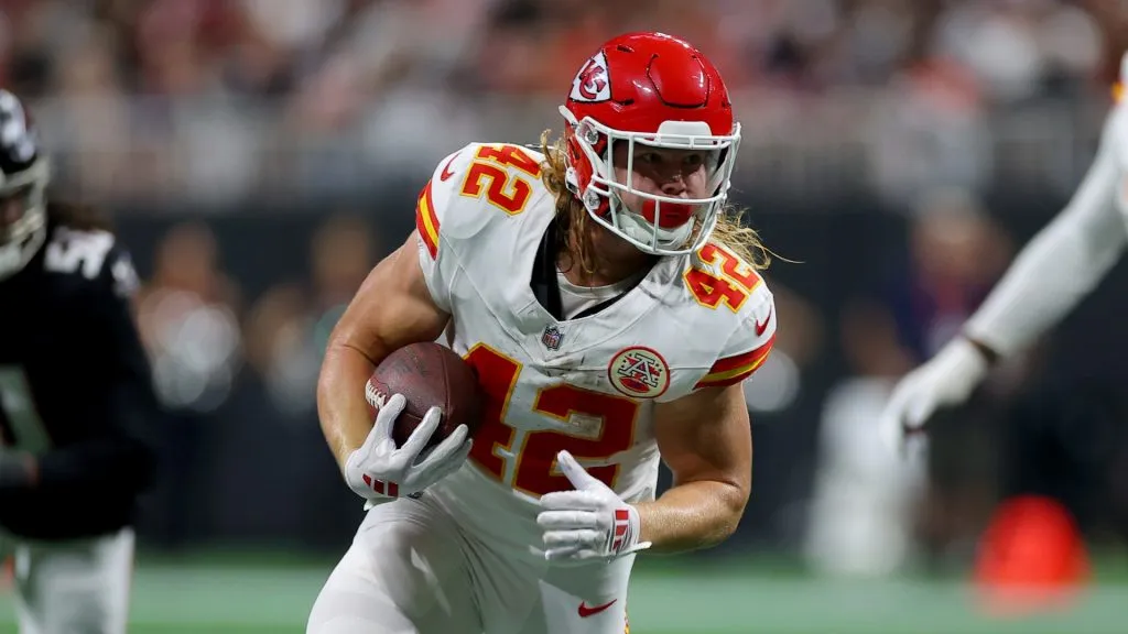Carson Steele #42 of the Kansas City Chiefs runs the ball during the first quarter against the Atlanta Falcons at Mercedes-Benz Stadium on September 22, 2024 in Atlanta, Georgia.